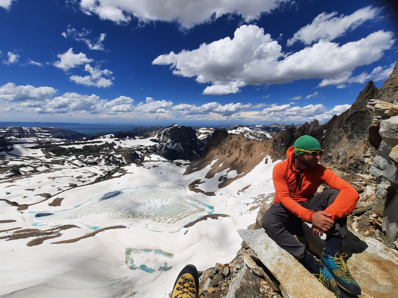 Summit with snowy mountain panorama