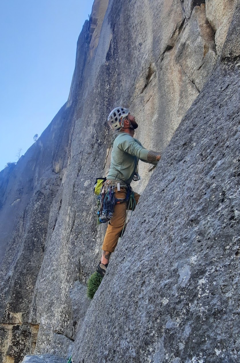 Trad climbing on granite wall